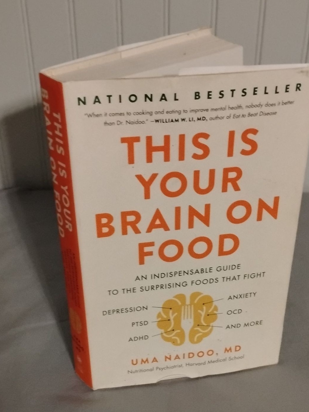 This Is Your Brain on Food by Uma Naidoo, MD - White & Orange Paperback